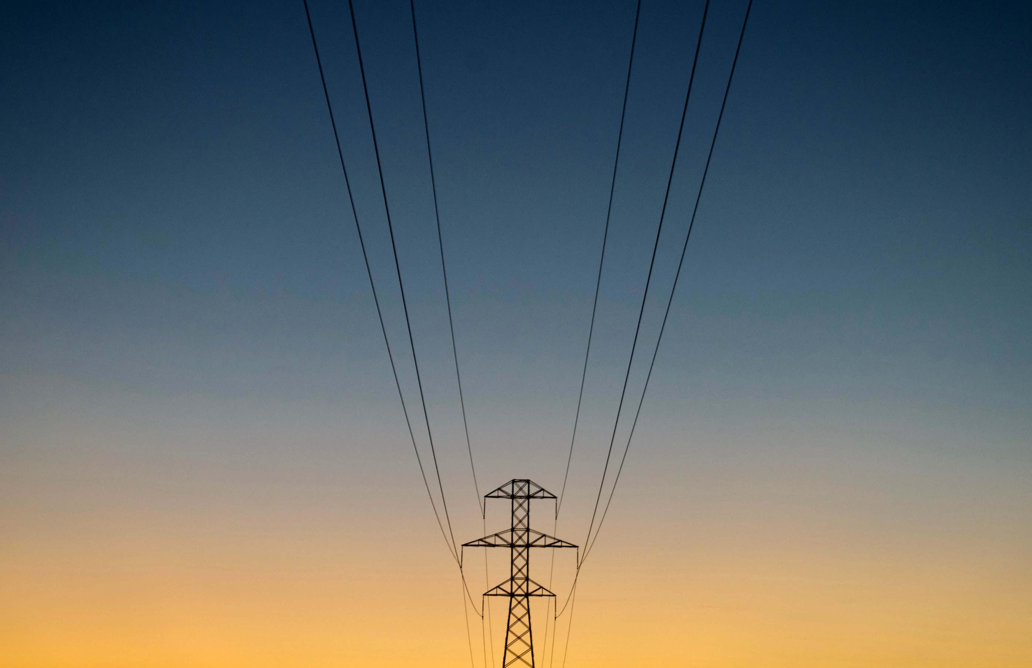 Power lines during sunset