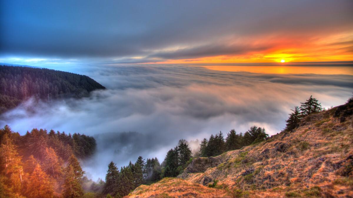 Clouds in the valley in autumn