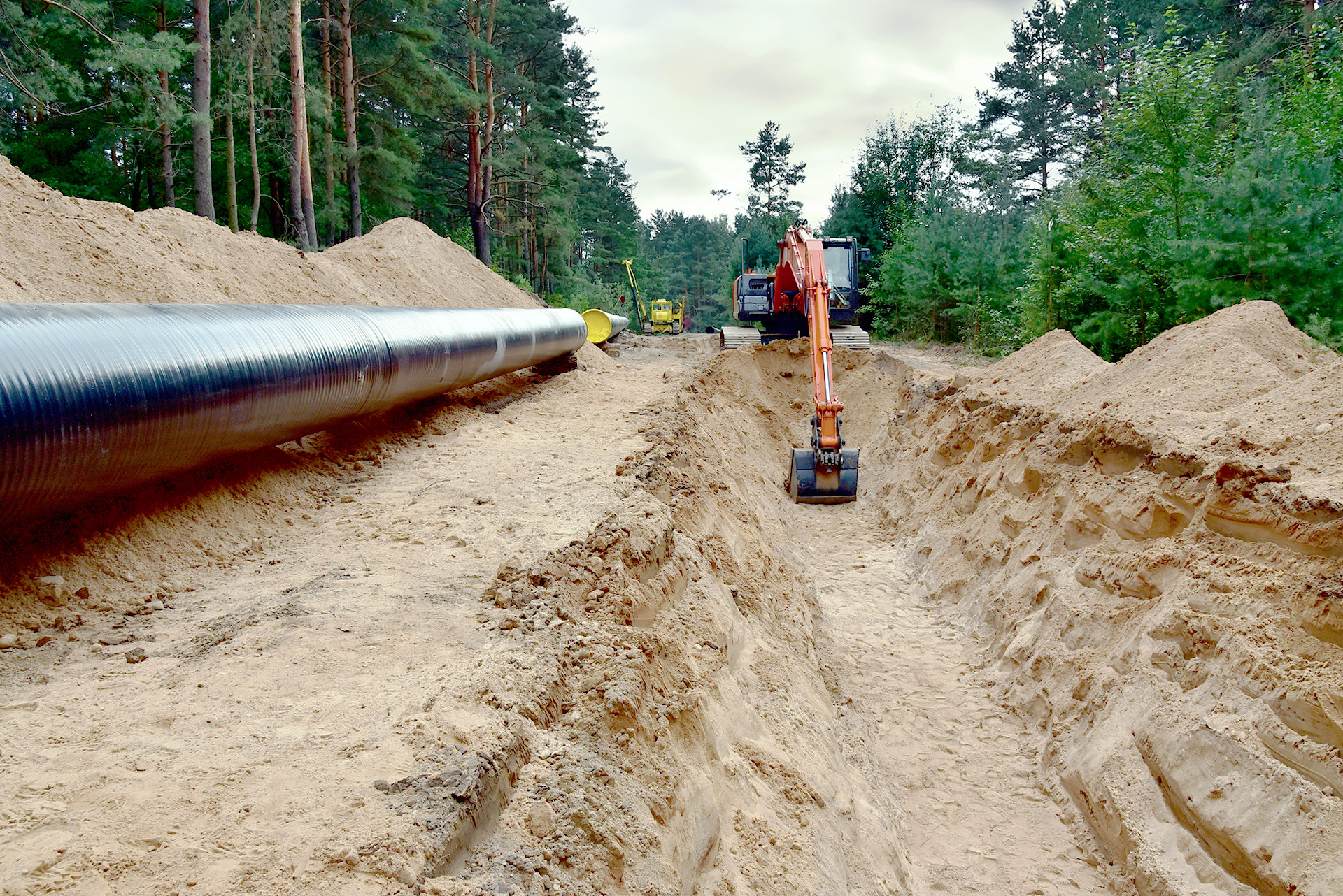 Image of an excavator in the filed to represent WS and Trench - Module