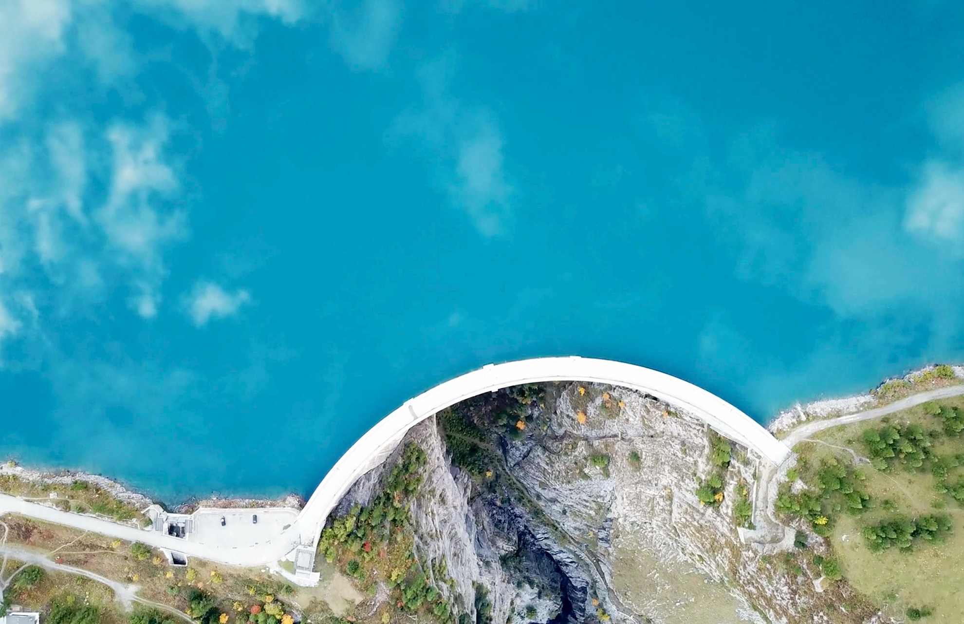 Image of a Dam seen from the birds view to represent Volue reports-and-presentations